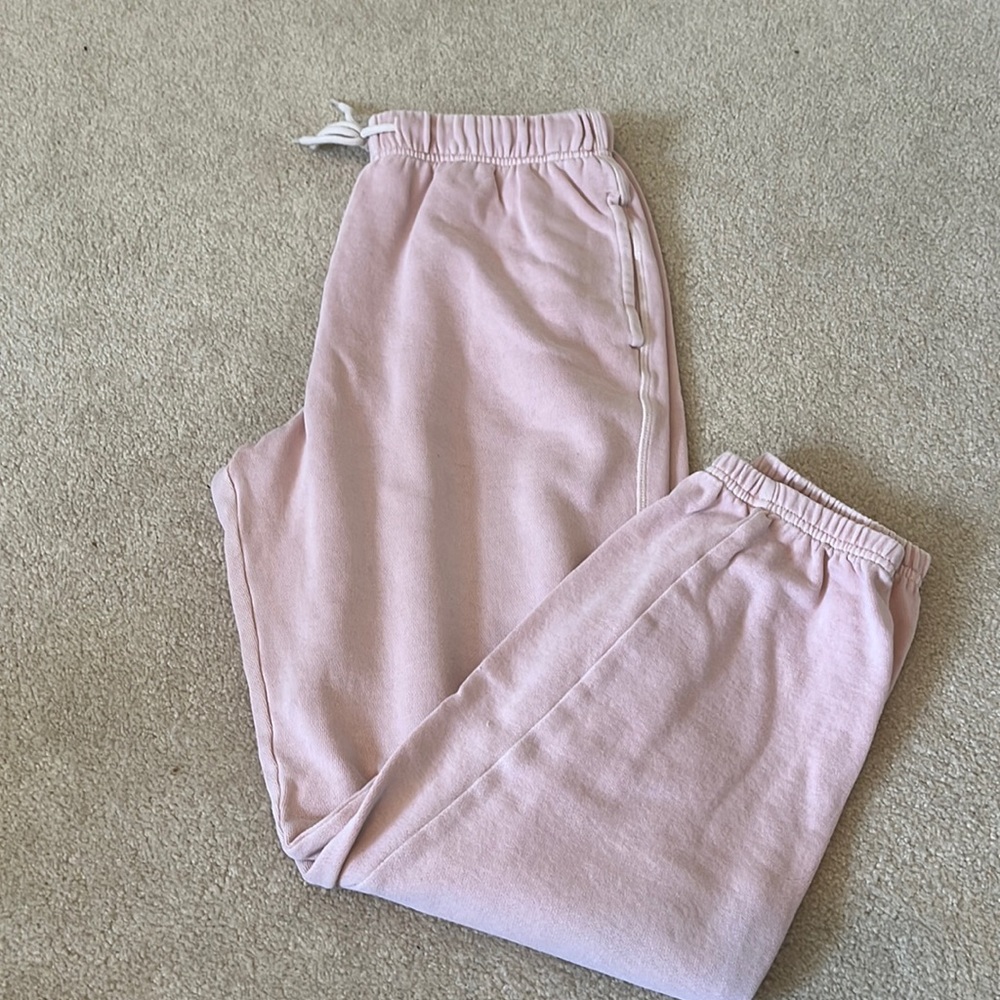 Pink sweatpants.